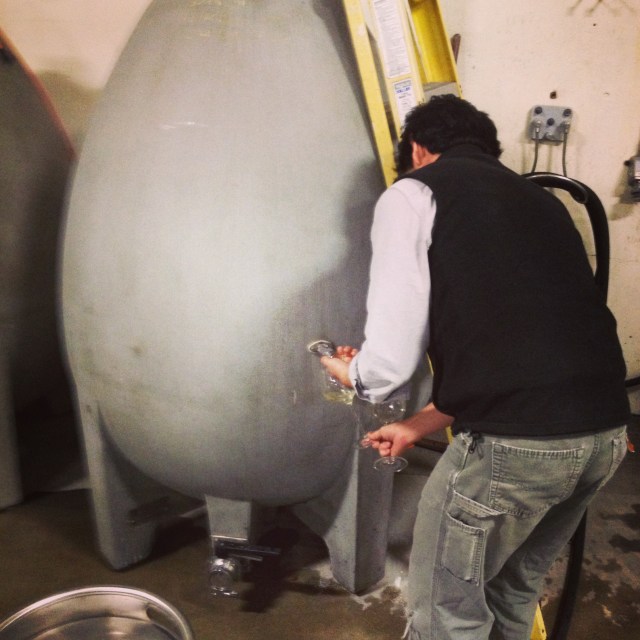 Byron, taking a sample from his cement egg.