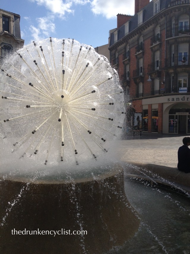A fountain in the center of Reims.