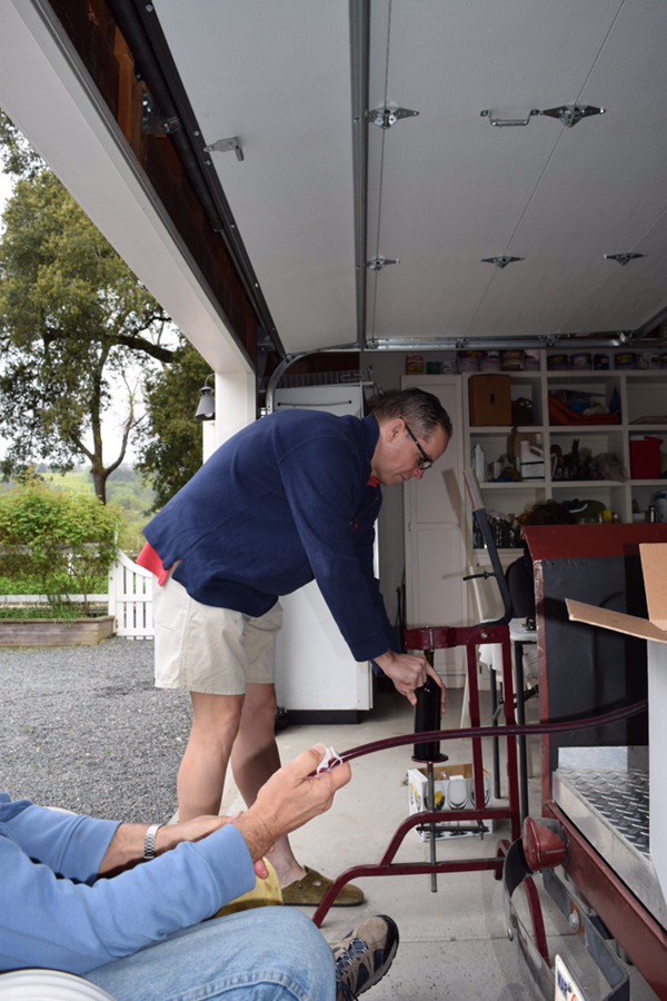 My first stop was in Dry Creek where I helped a good friend bottle his 2013, I mean 2014 Merlot. That is me operating the corker as my friend fills a bottle.