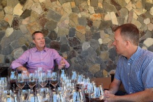 Robert Larsen, Bill Batchelor (right), and a whole host of wine glasses.